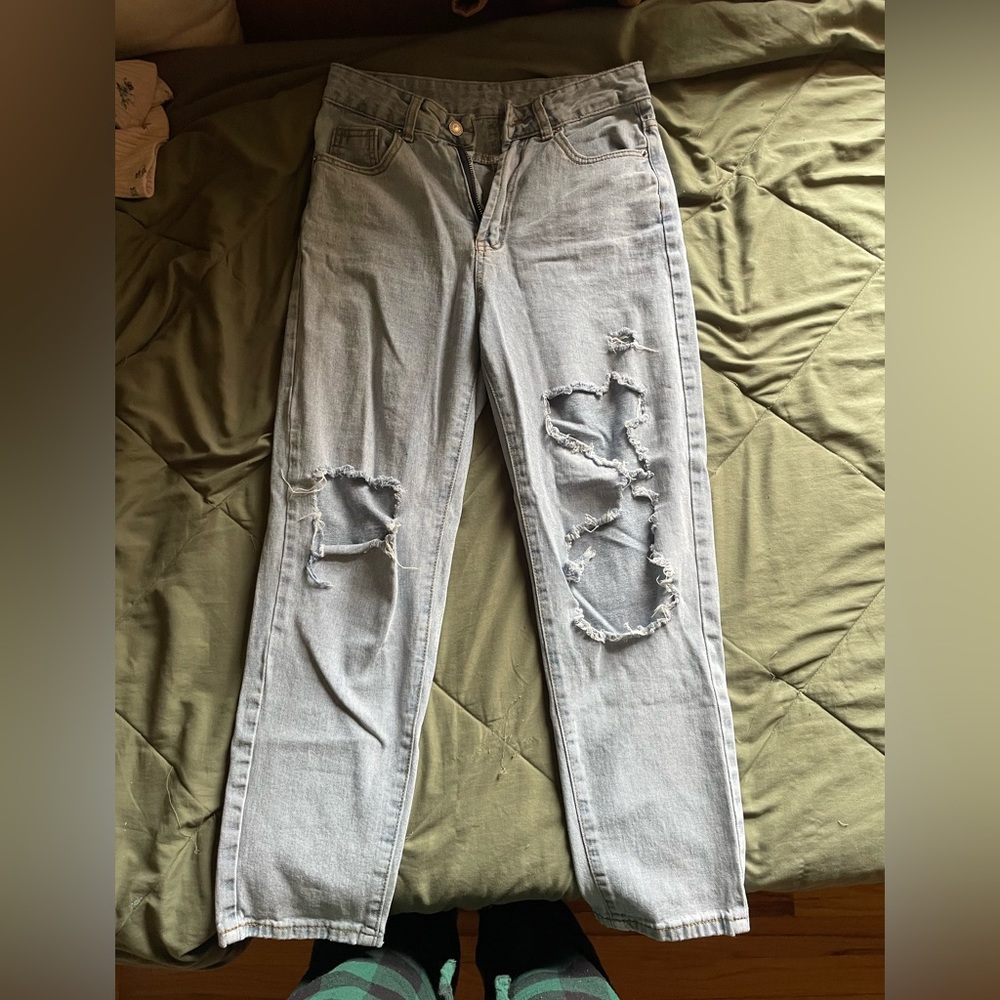 brand new light blue jeans